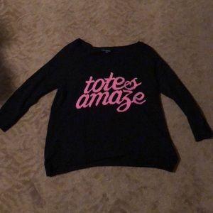 Black sweater that reads “totes amaze”